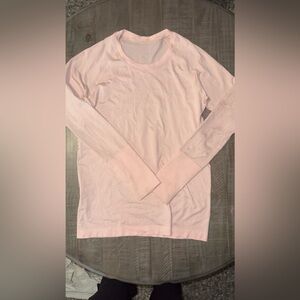 Light pink long sleeve lululemon swiftly tech T shirt AWSOME condition size 10
